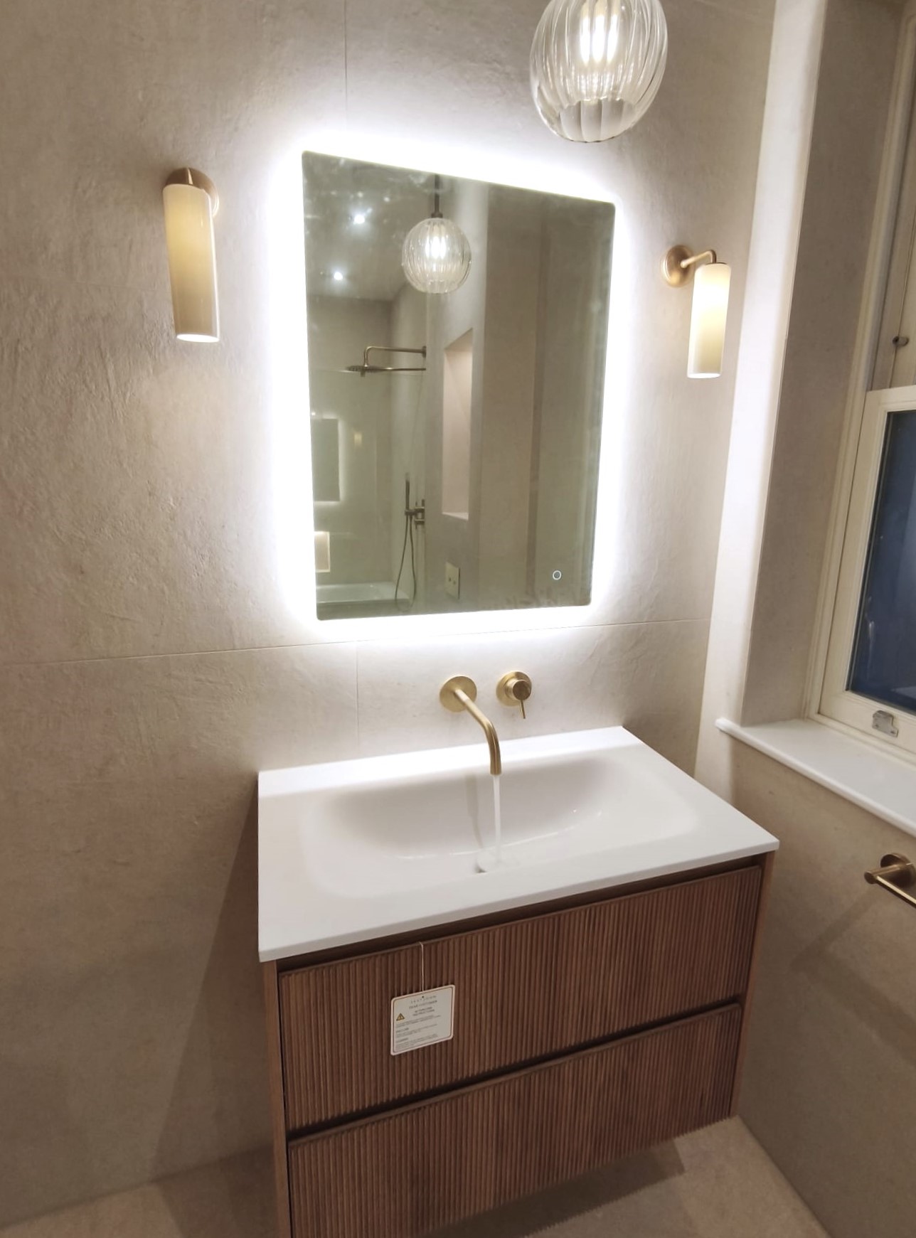 Mirror lighting in a modern bathroom vanity zone