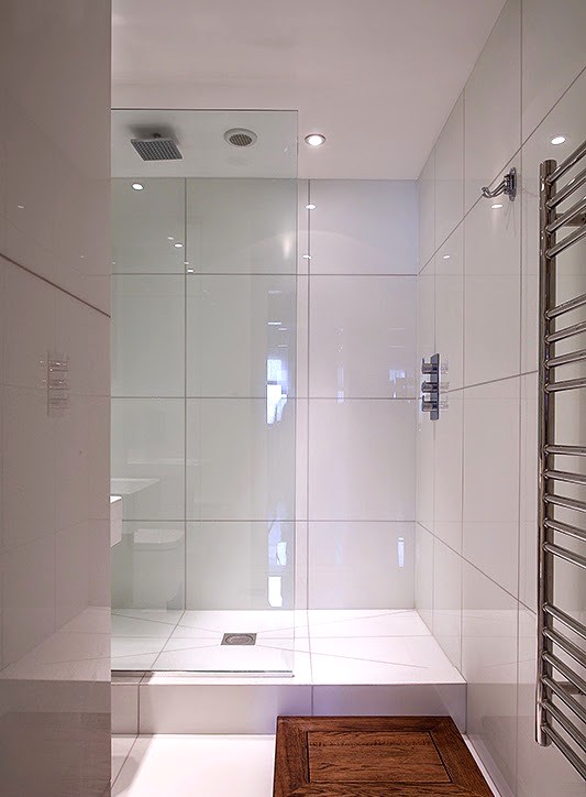Shower replacement layout with clean glass and calm finishes