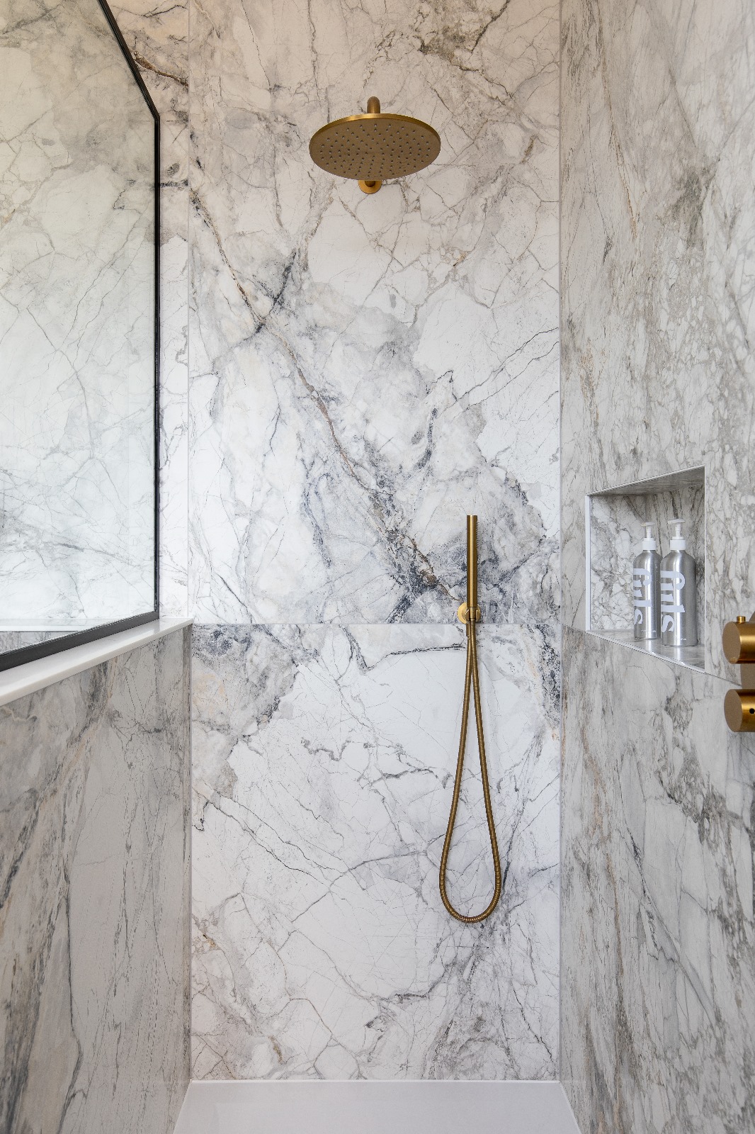 Premium wet room design with seamless floor finish