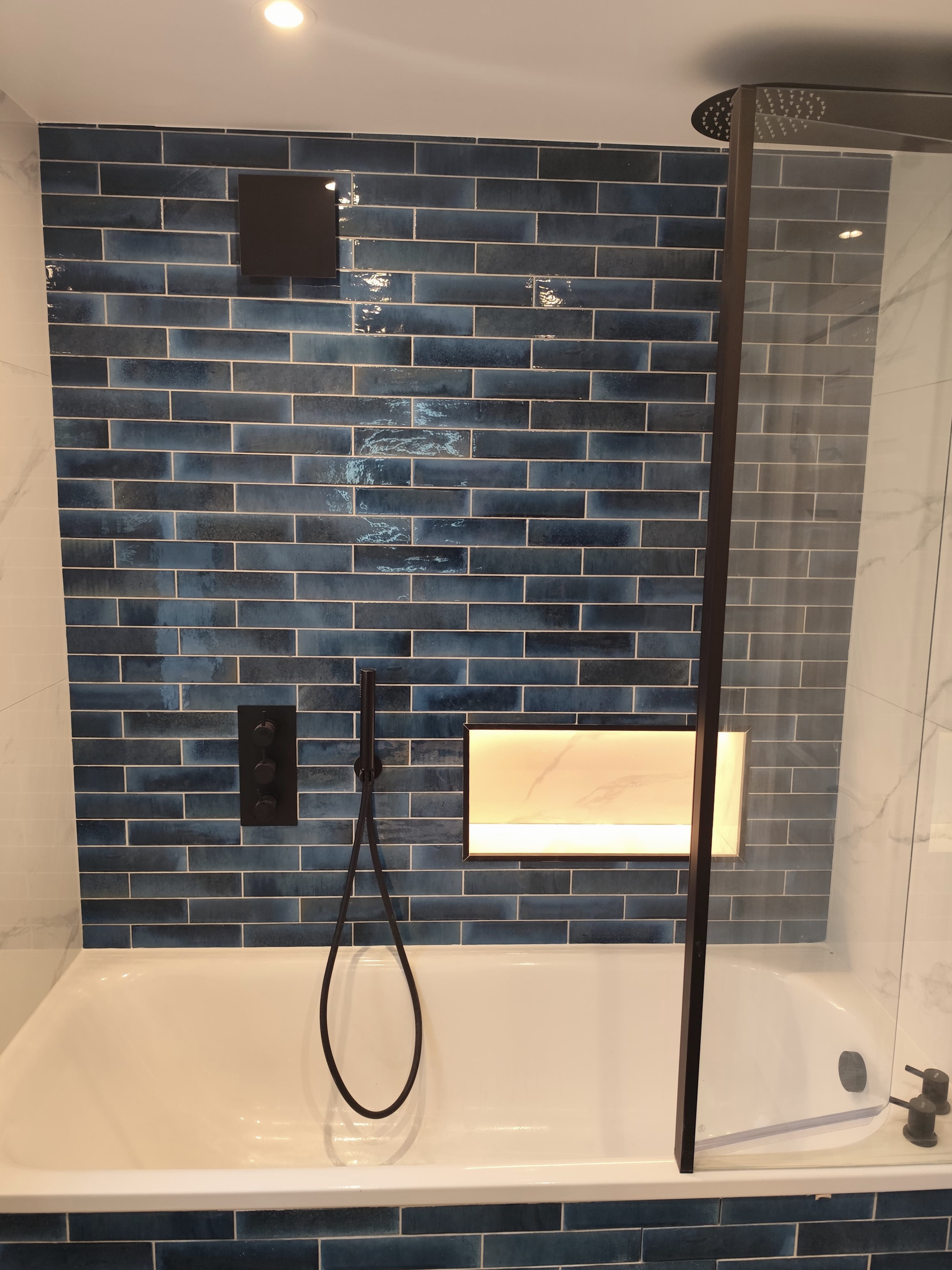 Small tiles used in a shower feature area
