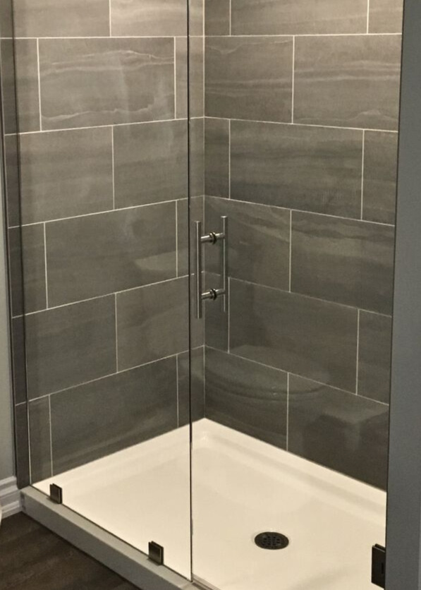 Bathroom tile and grout detail showing tonal grout