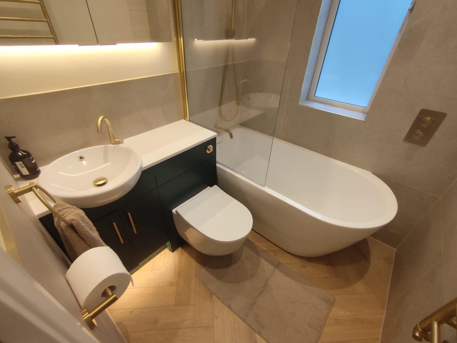 Bathroom with different wall and floor tile sizes