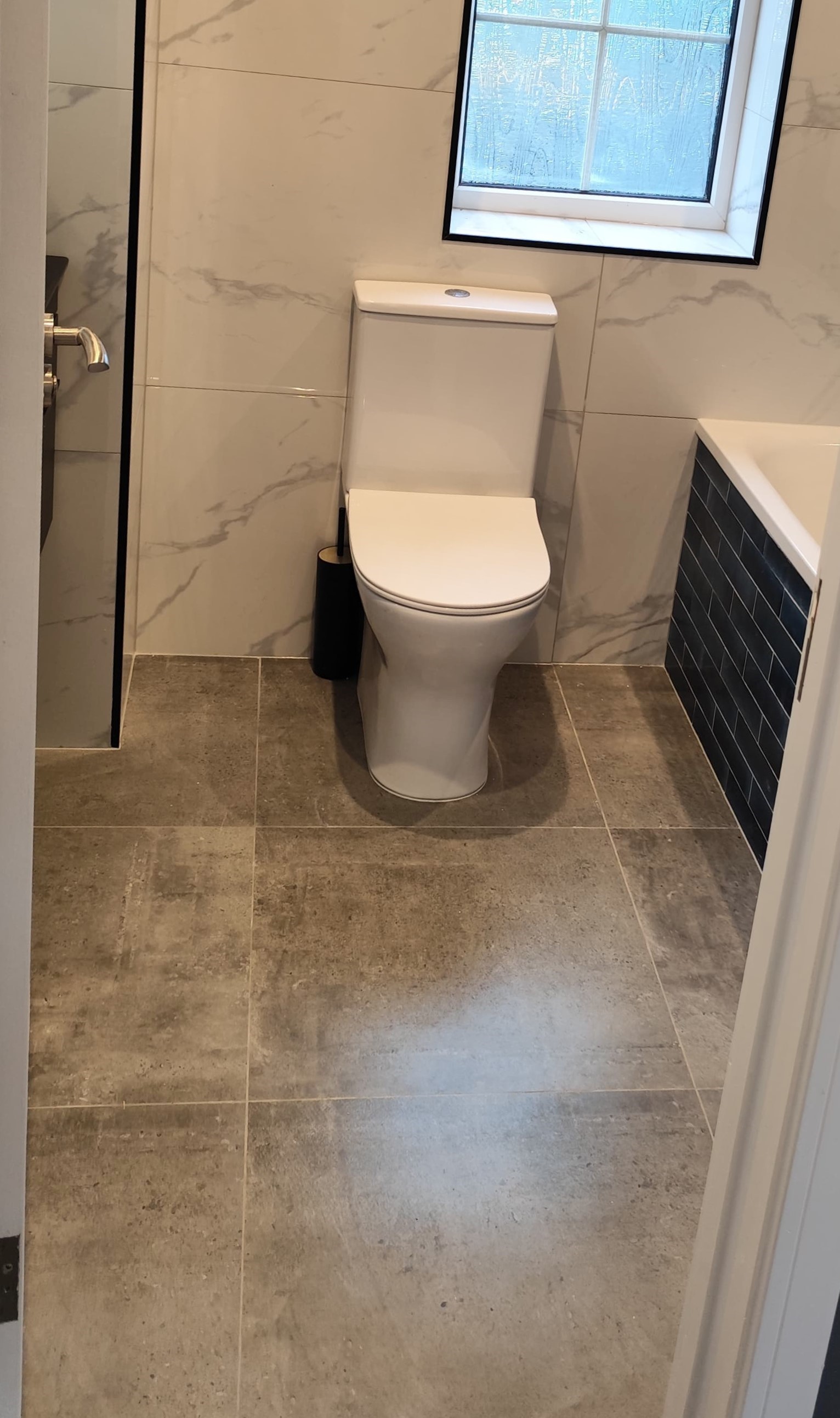 Bathroom tile surface showing grout line density