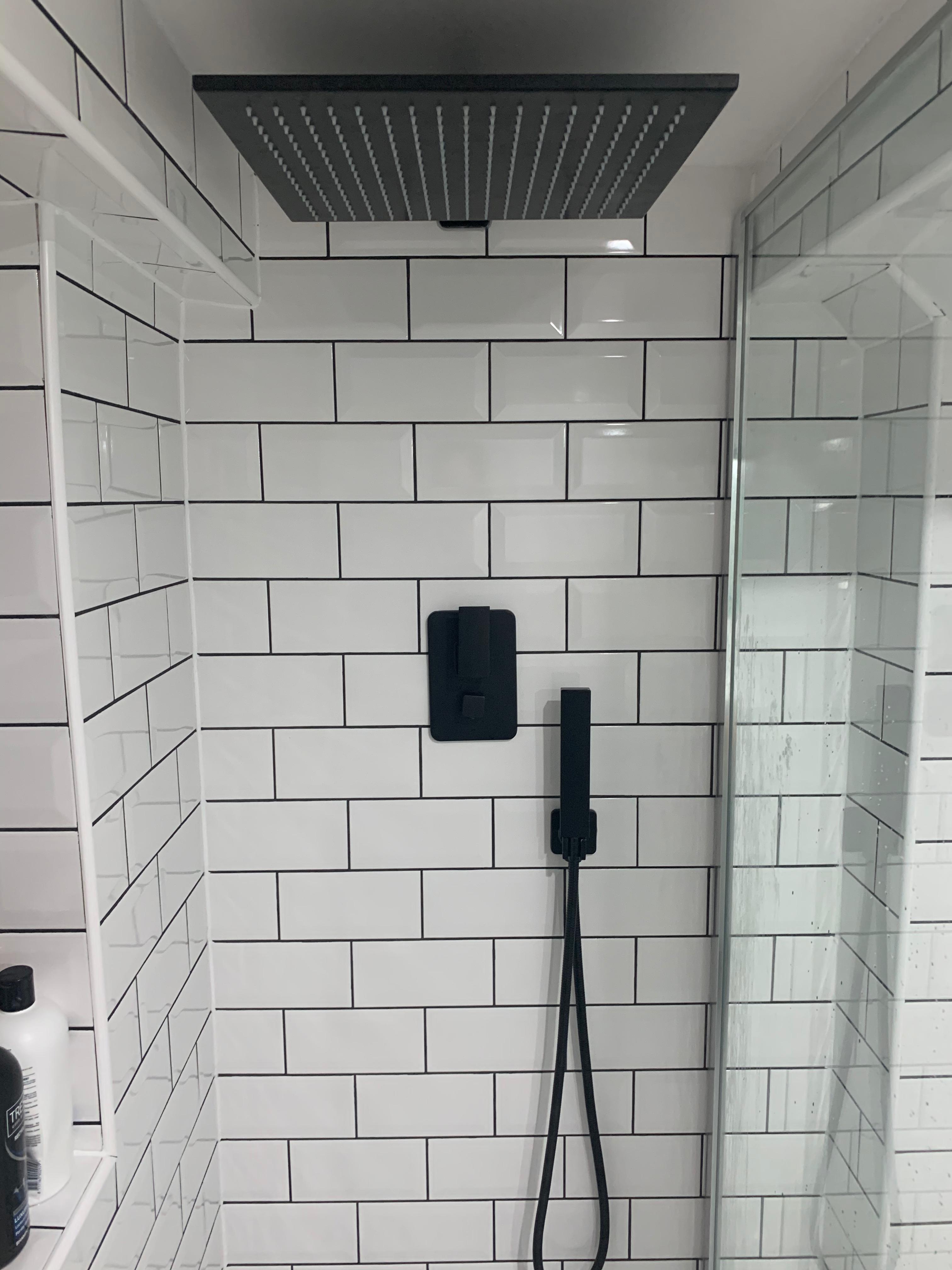 Small-format bathroom tiles adding texture and detail