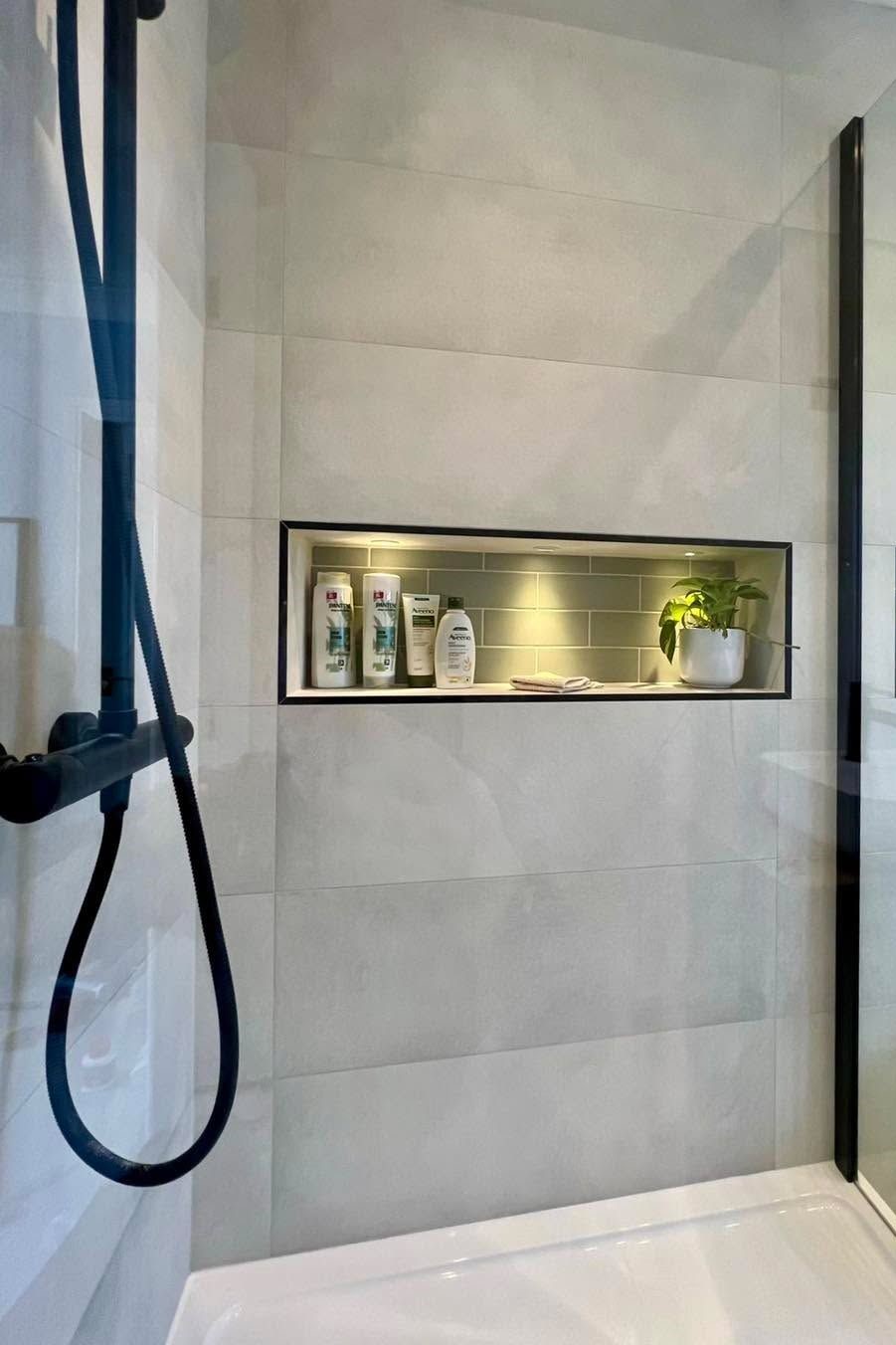 Integrated shower niche in a premium bathroom design