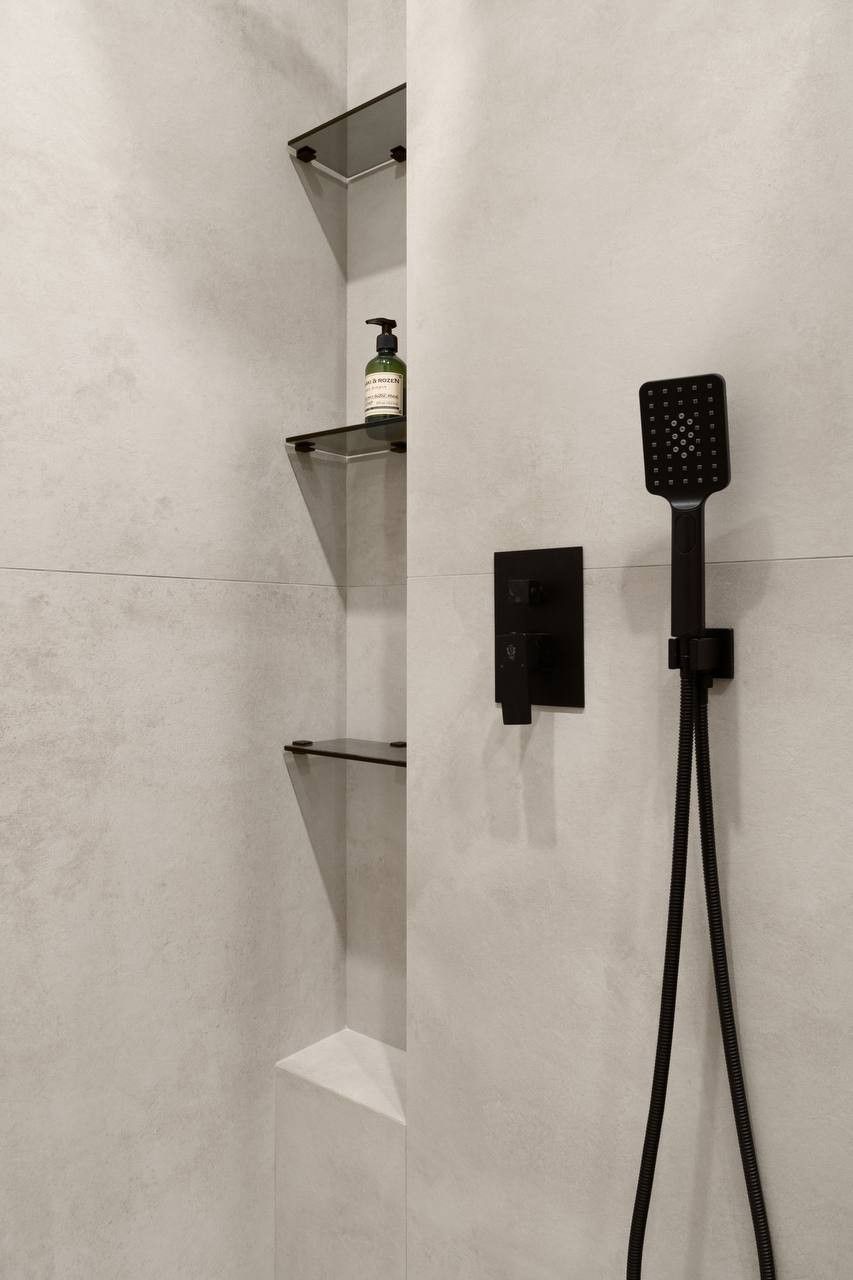 Shower shelf in a practical bathroom layout