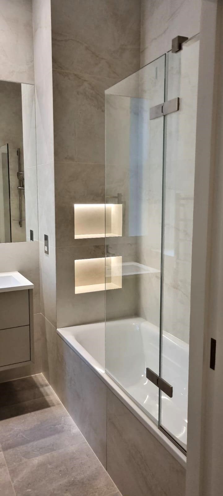 Integrated bathroom storage detail planned before tiling