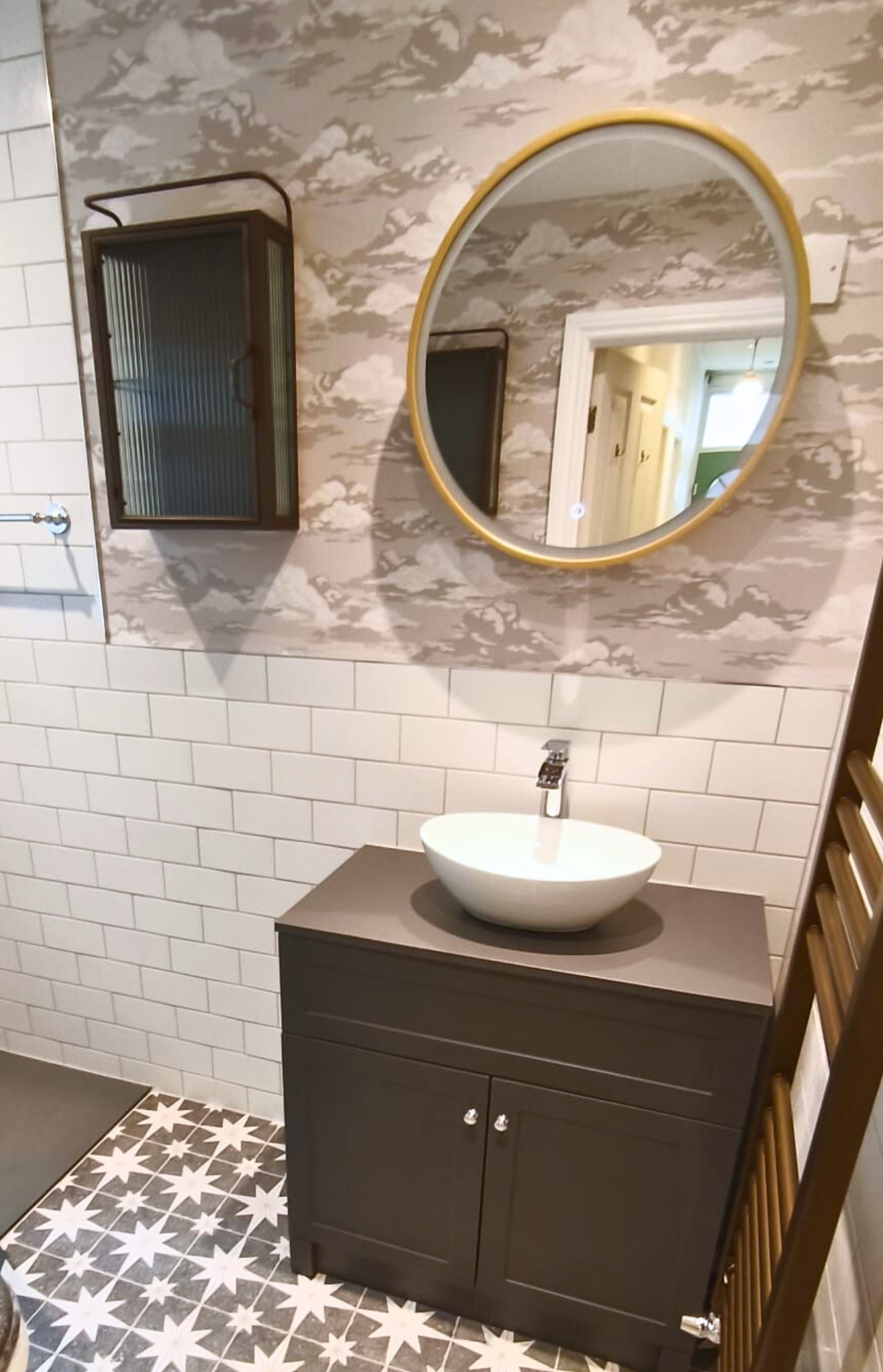 Wall-hung bathroom storage with clear circulation space