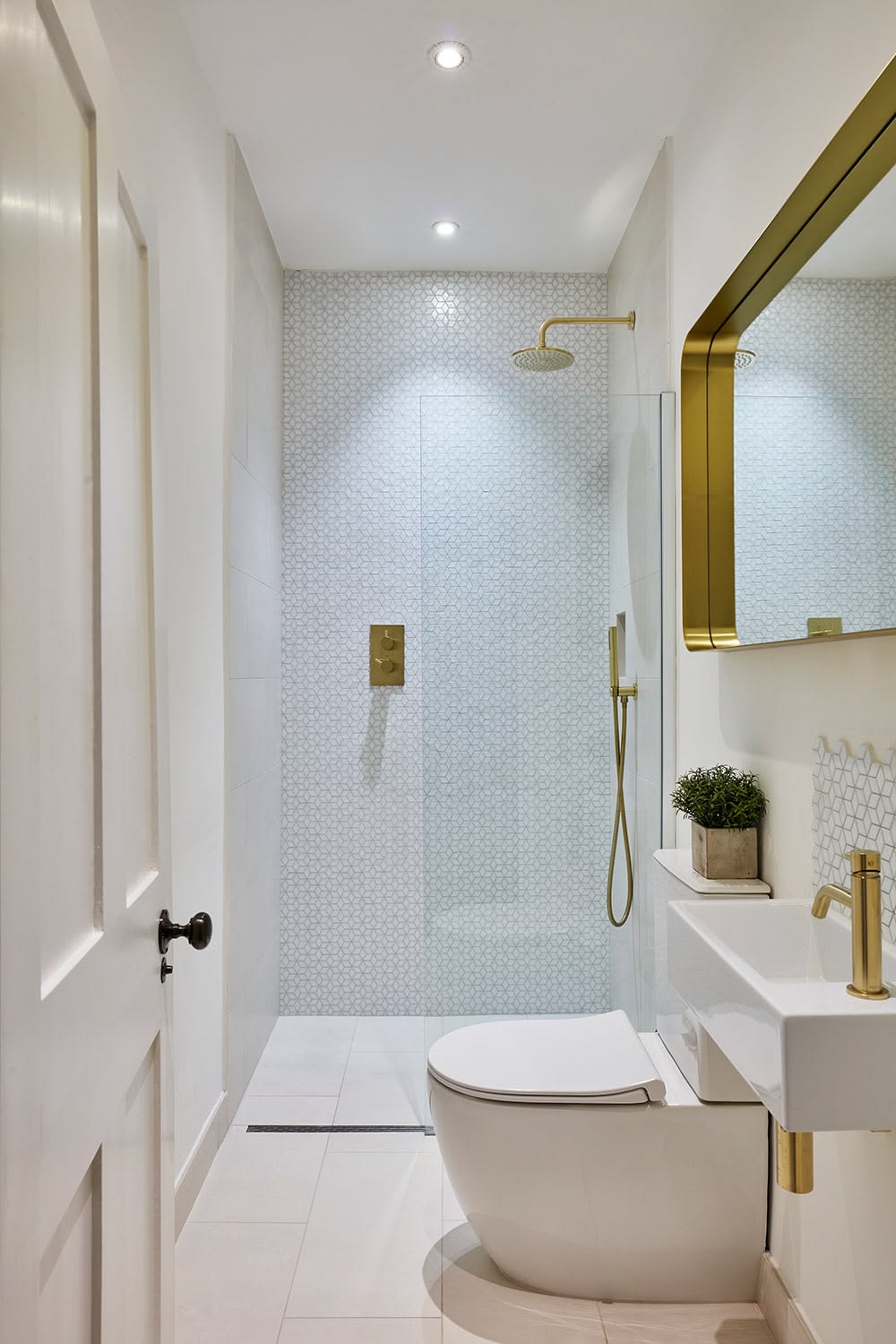 Small bathroom with improved shower and vanity layout