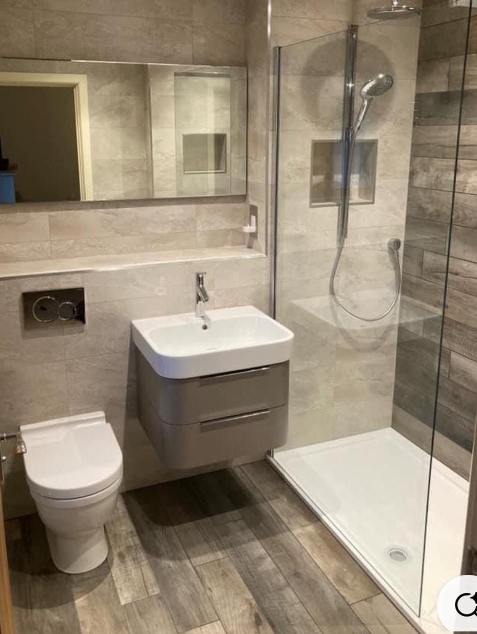 Shower-led bathroom after replacing a bath