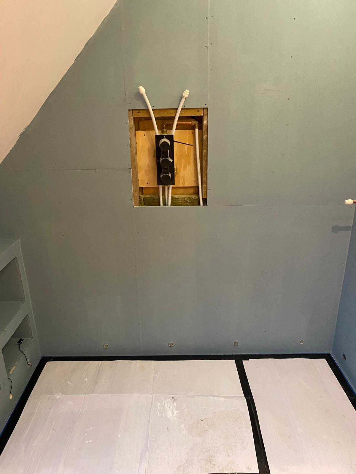 Bathroom plumbing rough-in during renovation planning