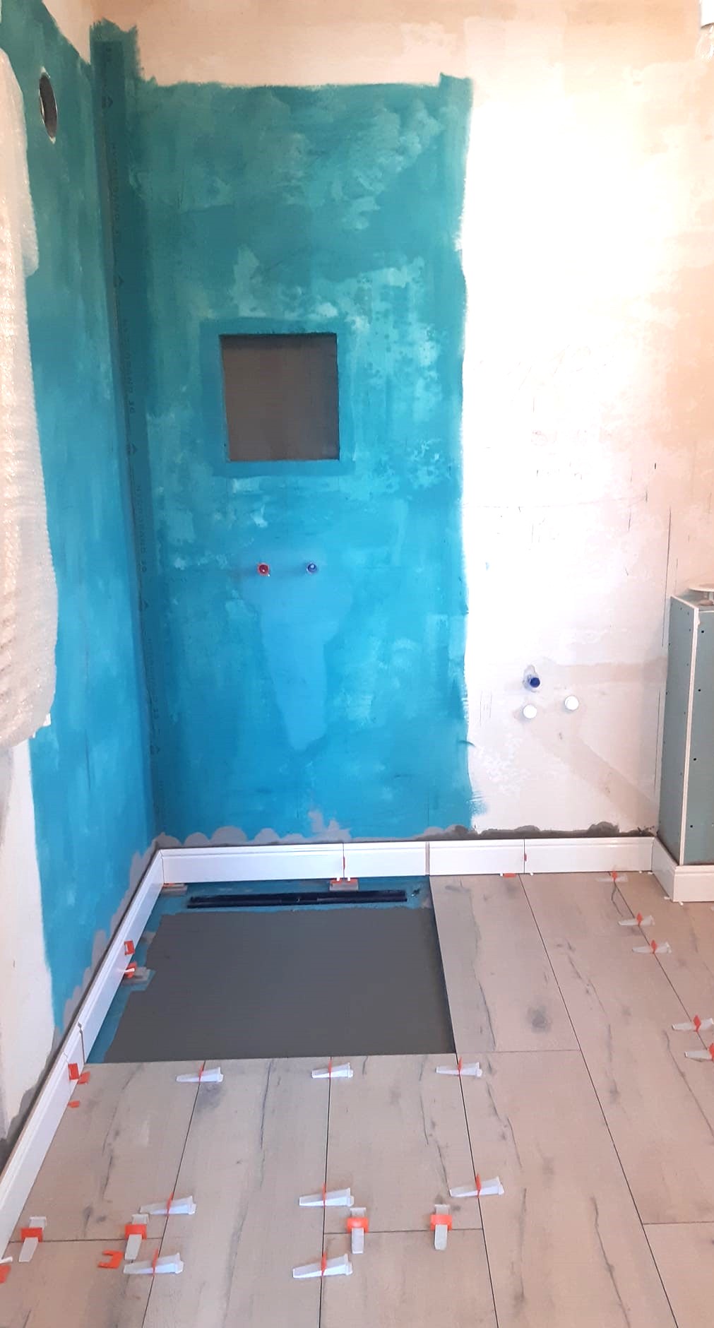 Shower wall preparation for built-in shelf installation