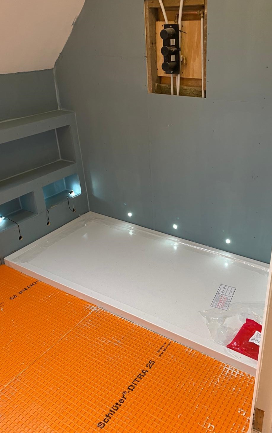 Waterproofing detail for a built-in shower shelf