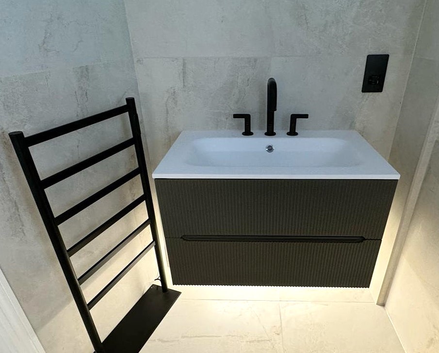 Compact vanity storage in a small bathroom