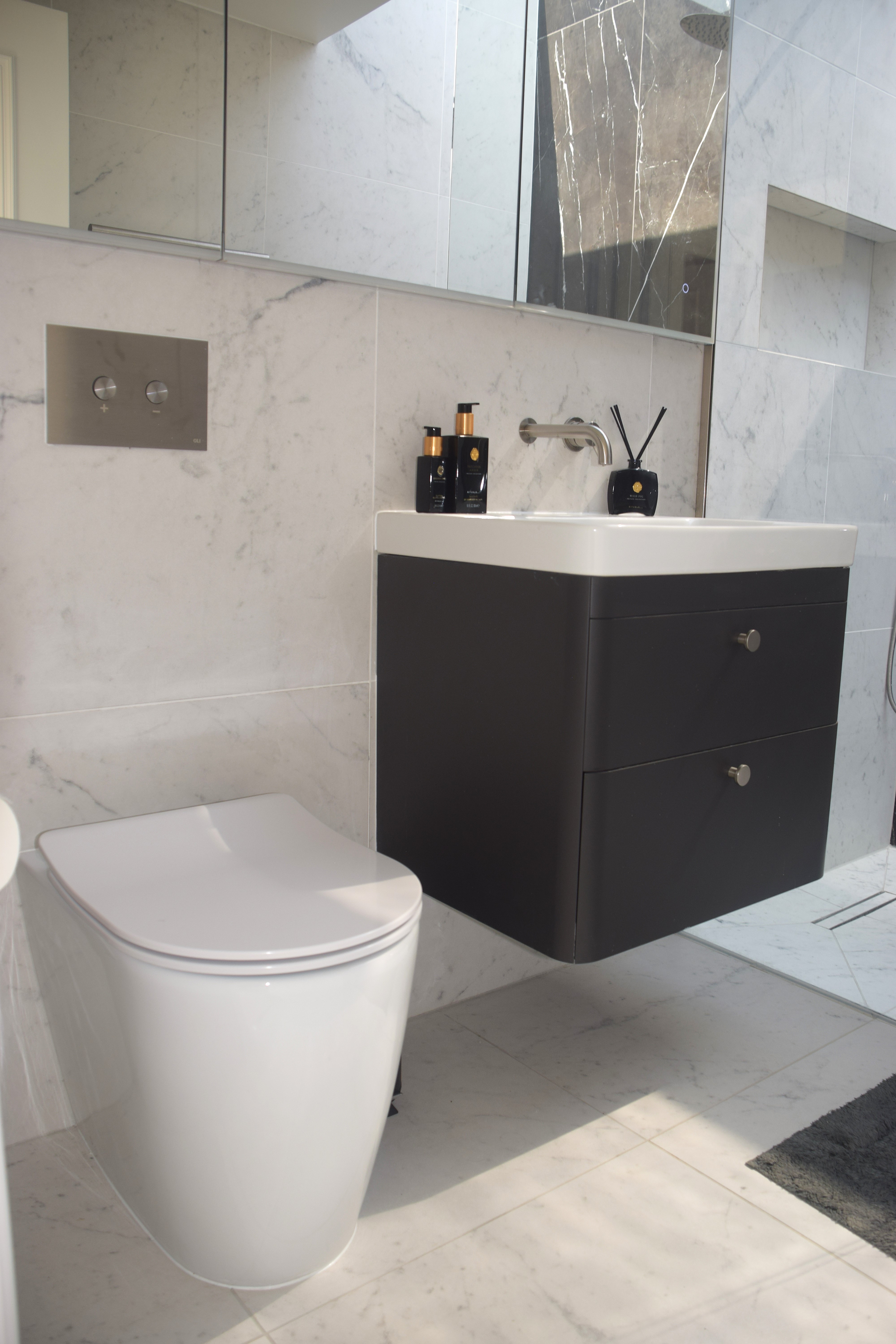 Closed storage in a compact bathroom