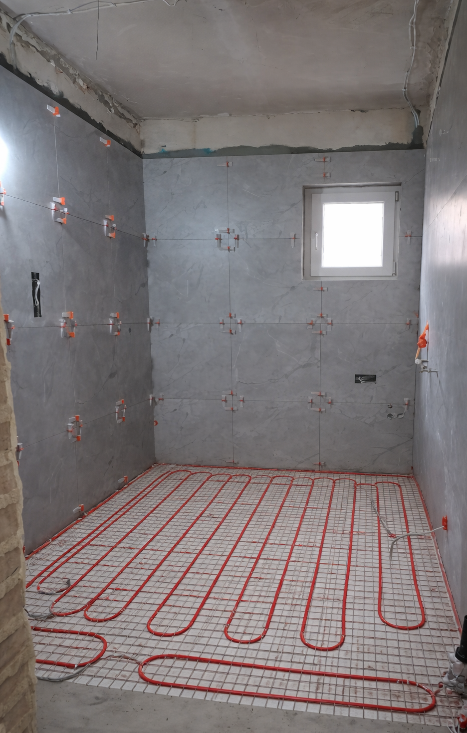 Underfloor heating installation in a bathroom renovation