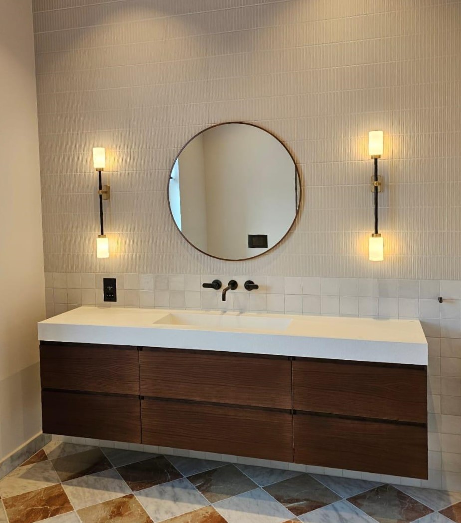 Bathroom mirror with wall lights on either side