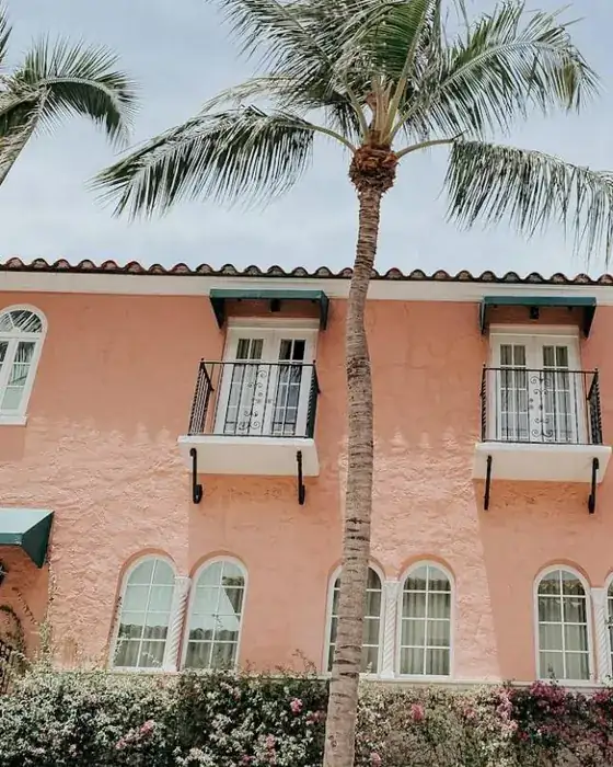 Mediterranean-style building with palm trees in Florida