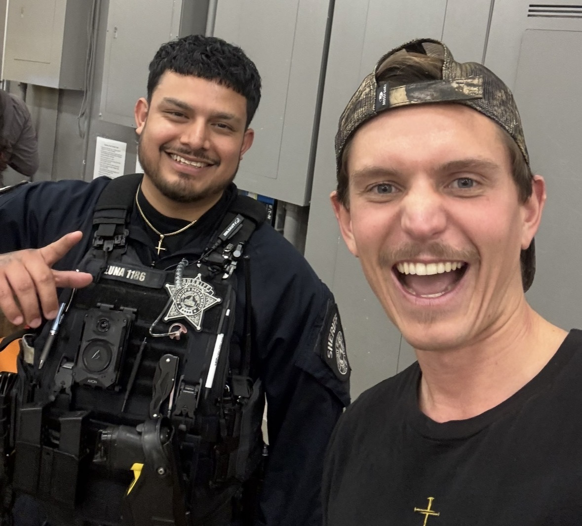 John with a local officer