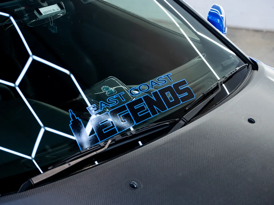 Hexagonal light ceiling reflected in the R34 windshield
