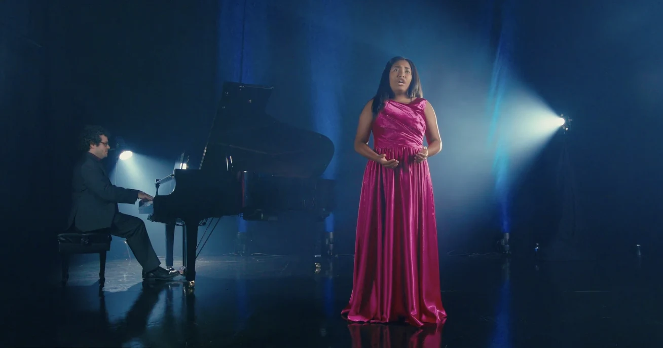 Opera singer performing with piano accompaniment