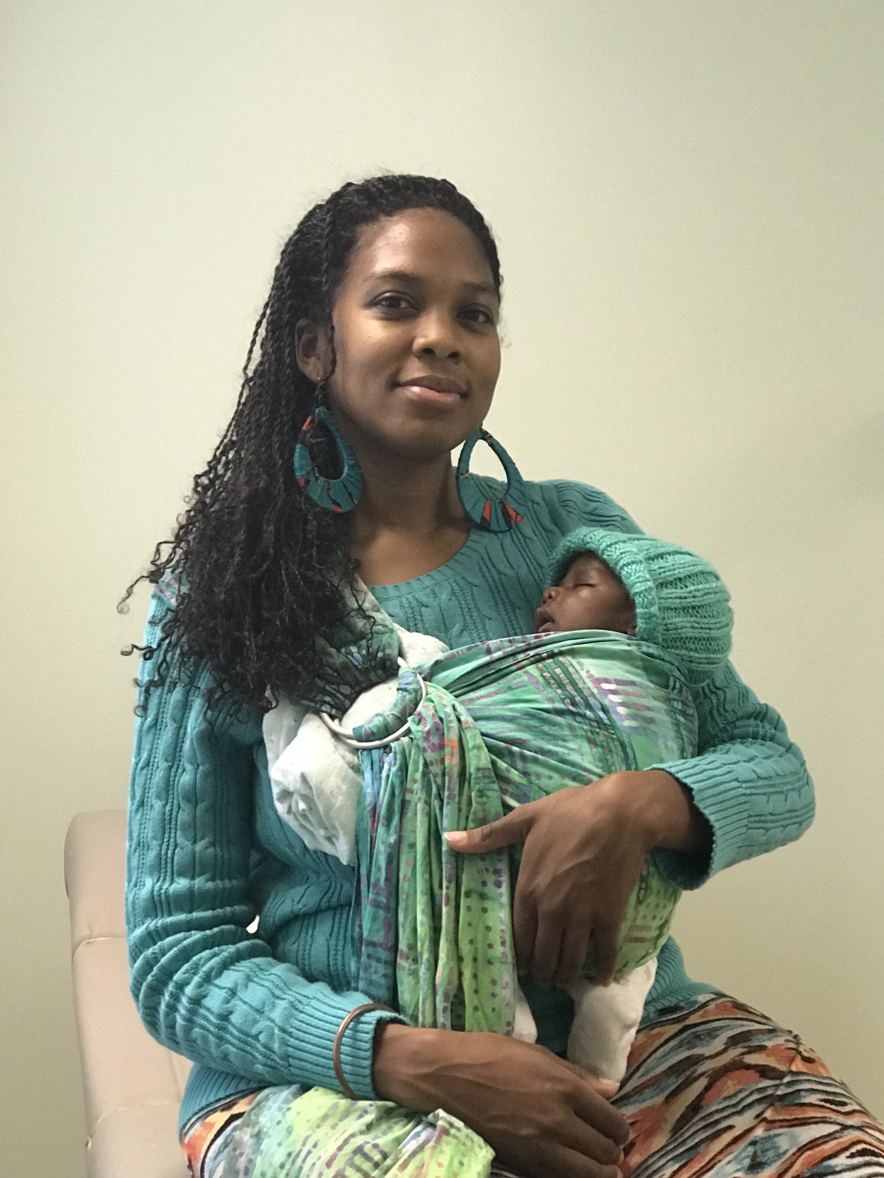 Yolanda Shiphrah Kadima holding her baby