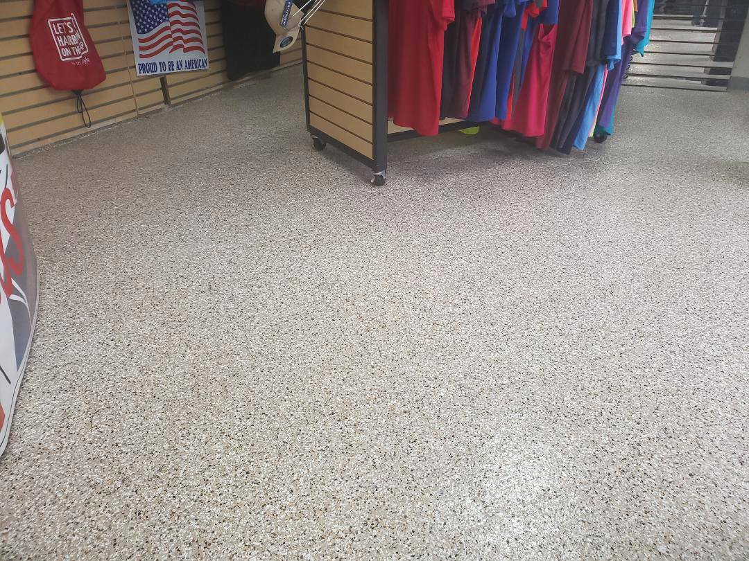 High-gloss retail epoxy floor coating for a showroom in Mason OH