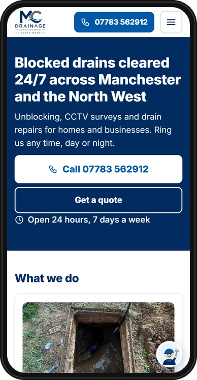 The MC Drainage Solutions home page on a phone, with the call button and the live chat button showing