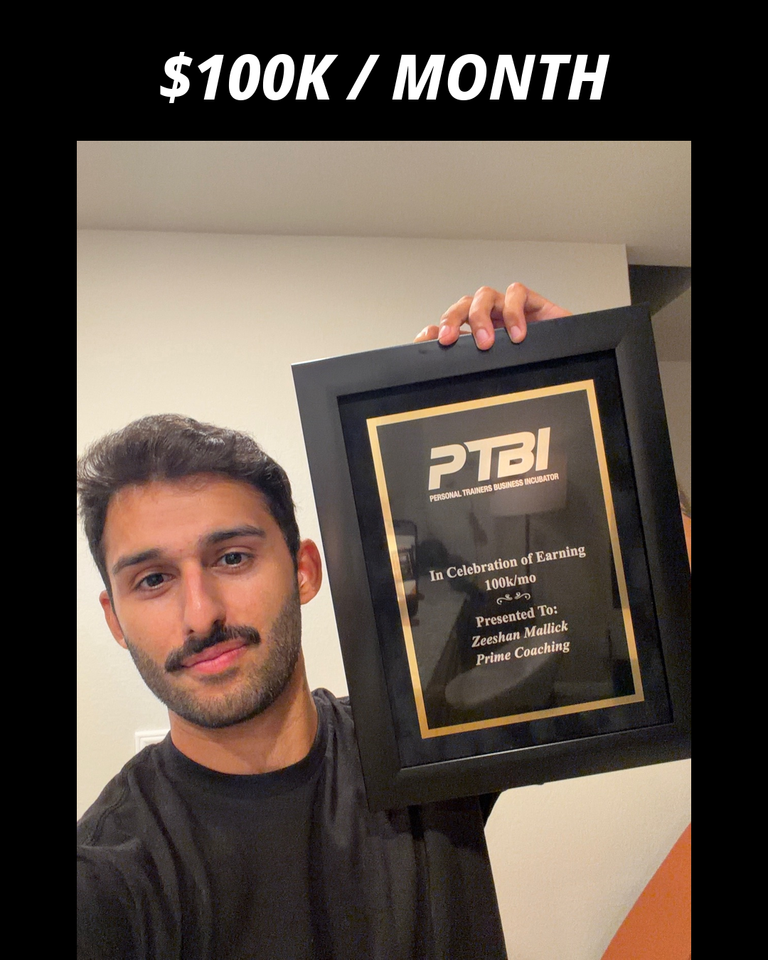 Zeeshan Mallick holding his PTBI win plaque