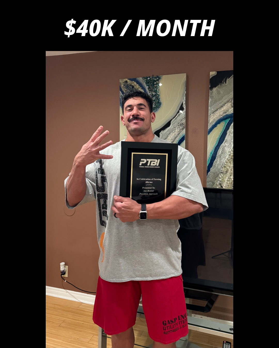 Ian Benisti holding his PTBI win plaque
