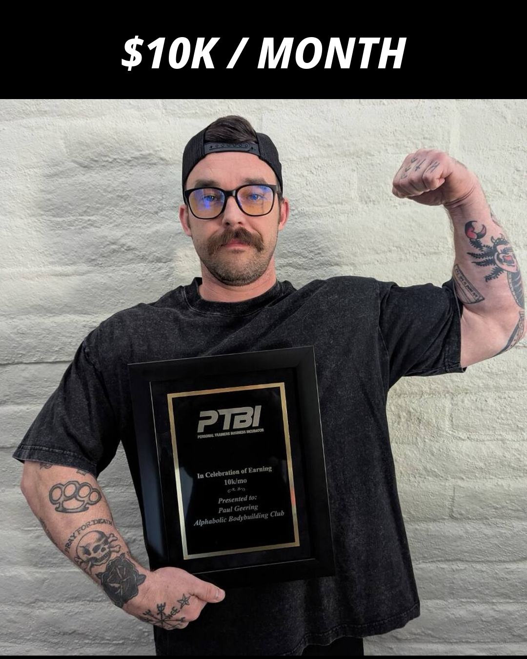 Paul Geering holding his PTBI win plaque