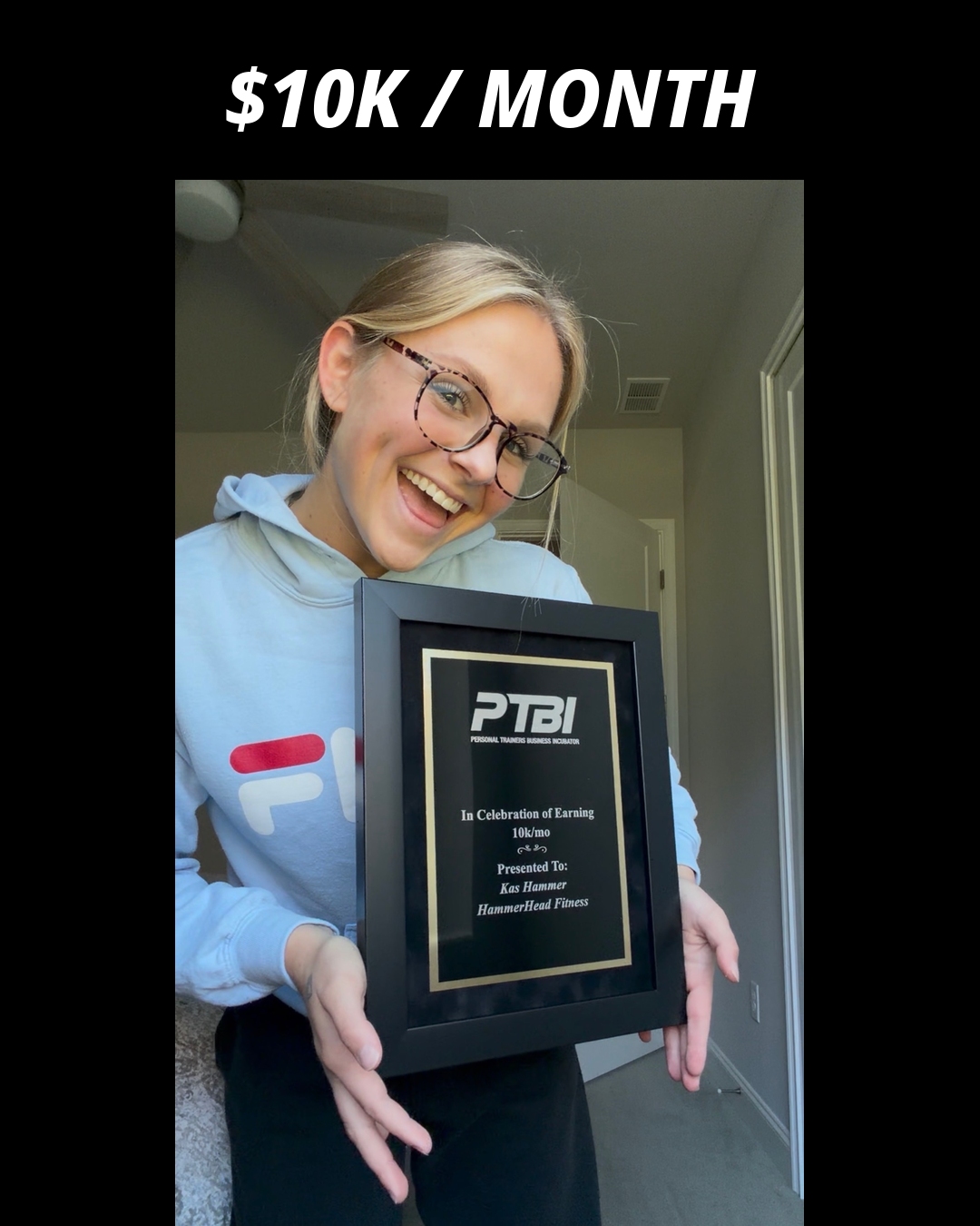 Kas Hammer holding their PTBI win plaque