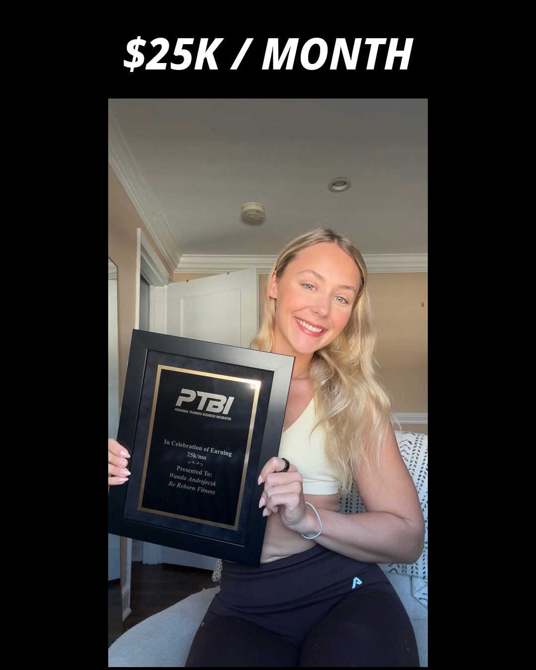 Wanda Andrejecsk holding her PTBI win plaque