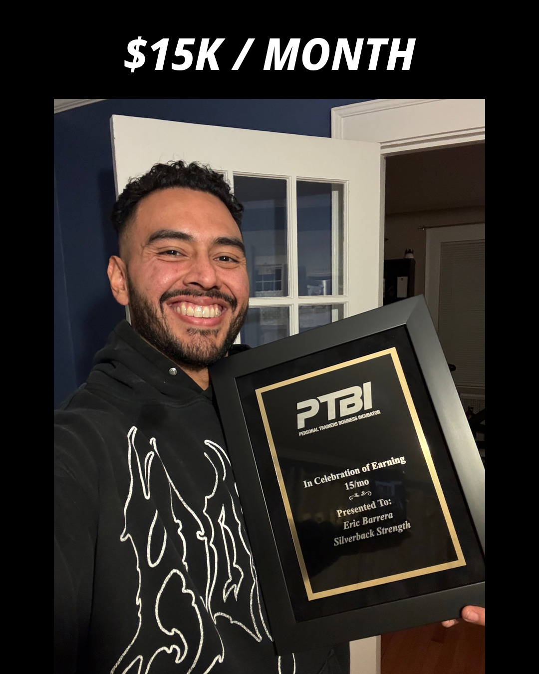 Eric Barrera holding his PTBI win plaque