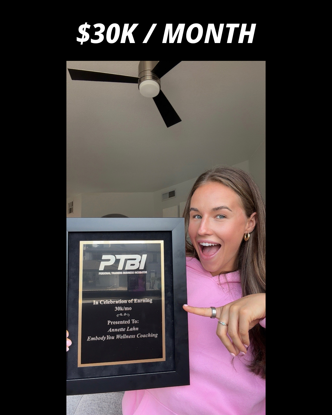 Annette Lahn holding her PTBI win plaque