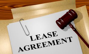 lease agreement underneath a judge's gavel