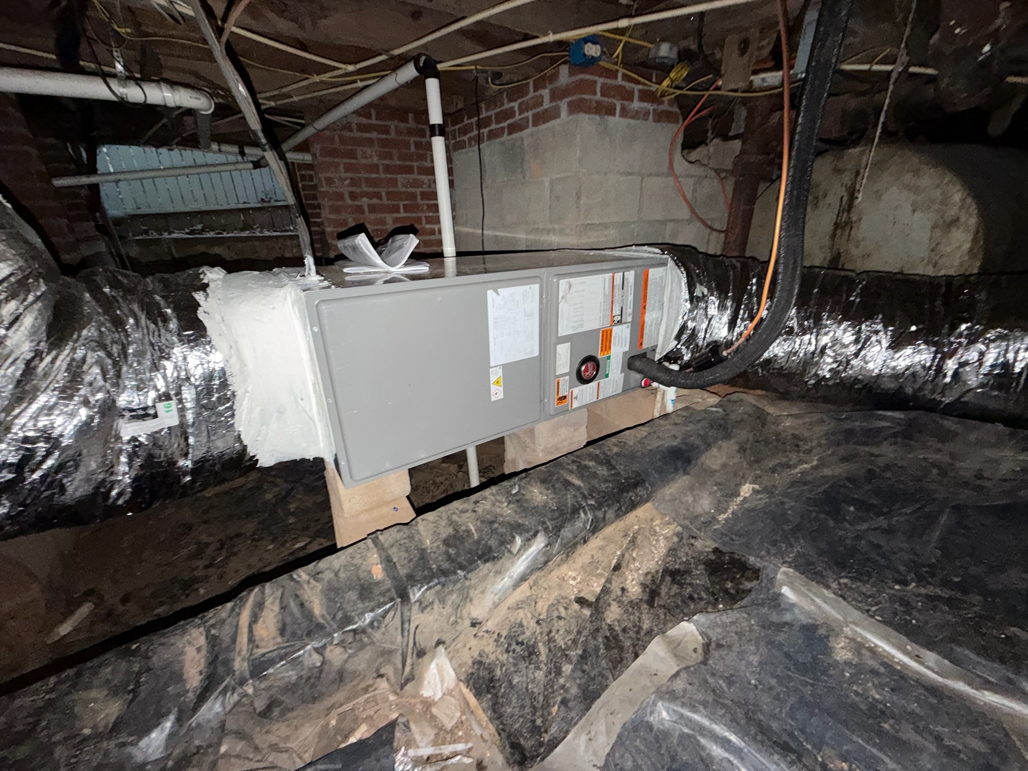 Steven on a heat-pump or furnace diagnostic in winter