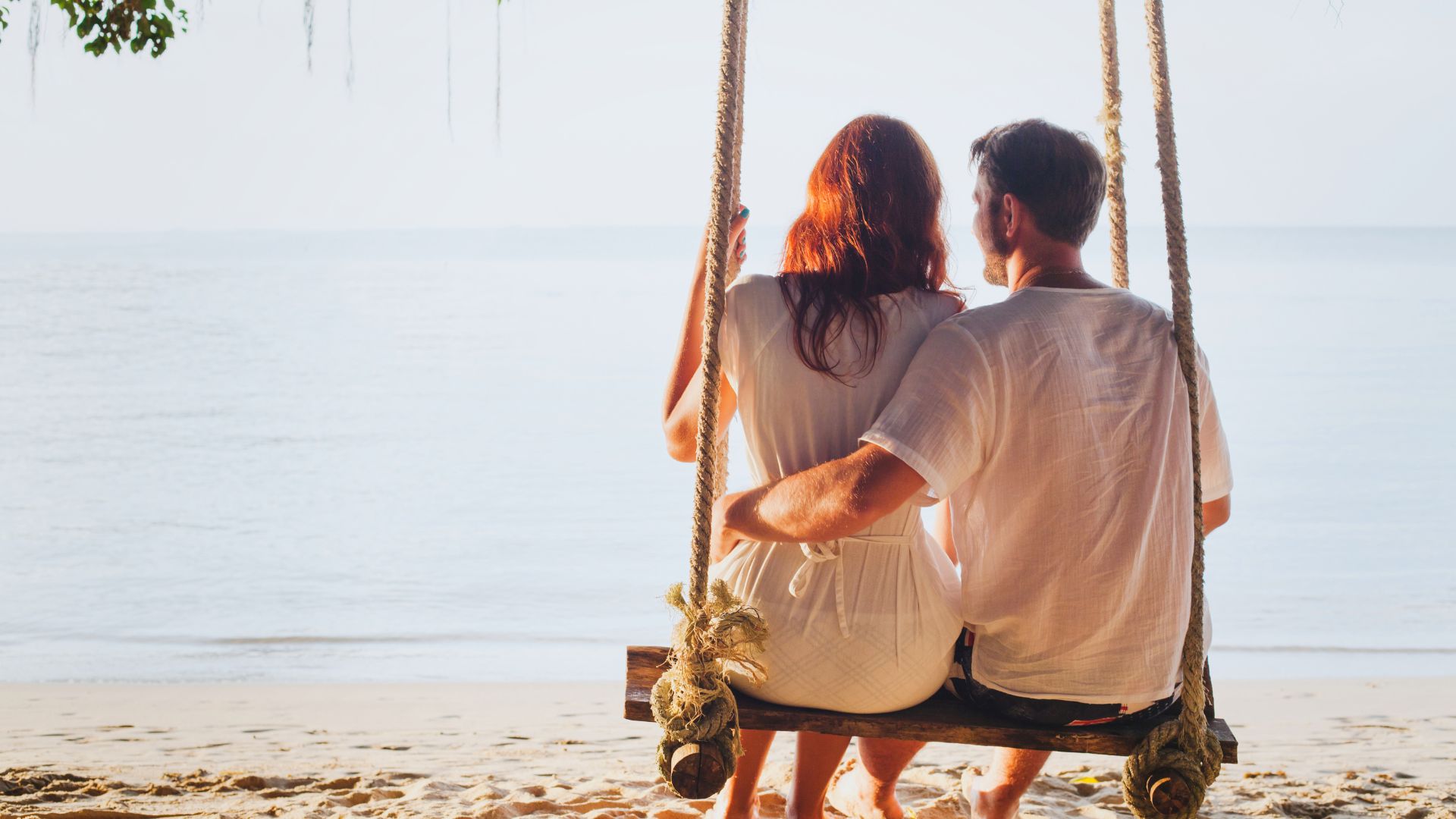 Couple relaxing by the sea
