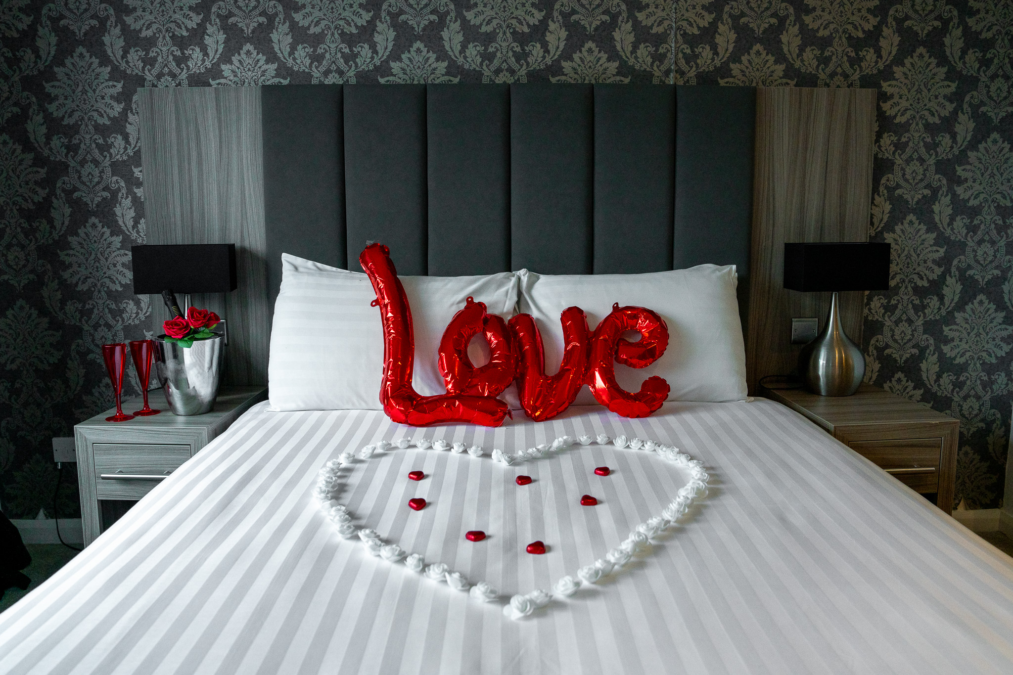 A comfortable bedroom at Parkmore Hotel