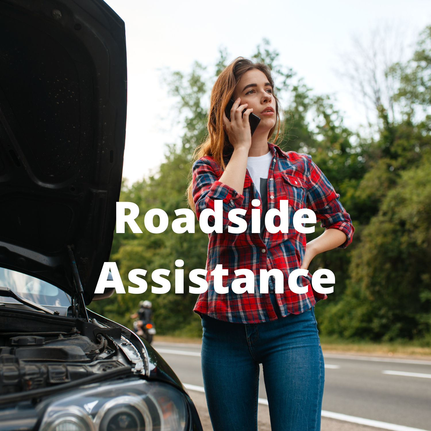 Woman talking on phone waiting for roadside assistance