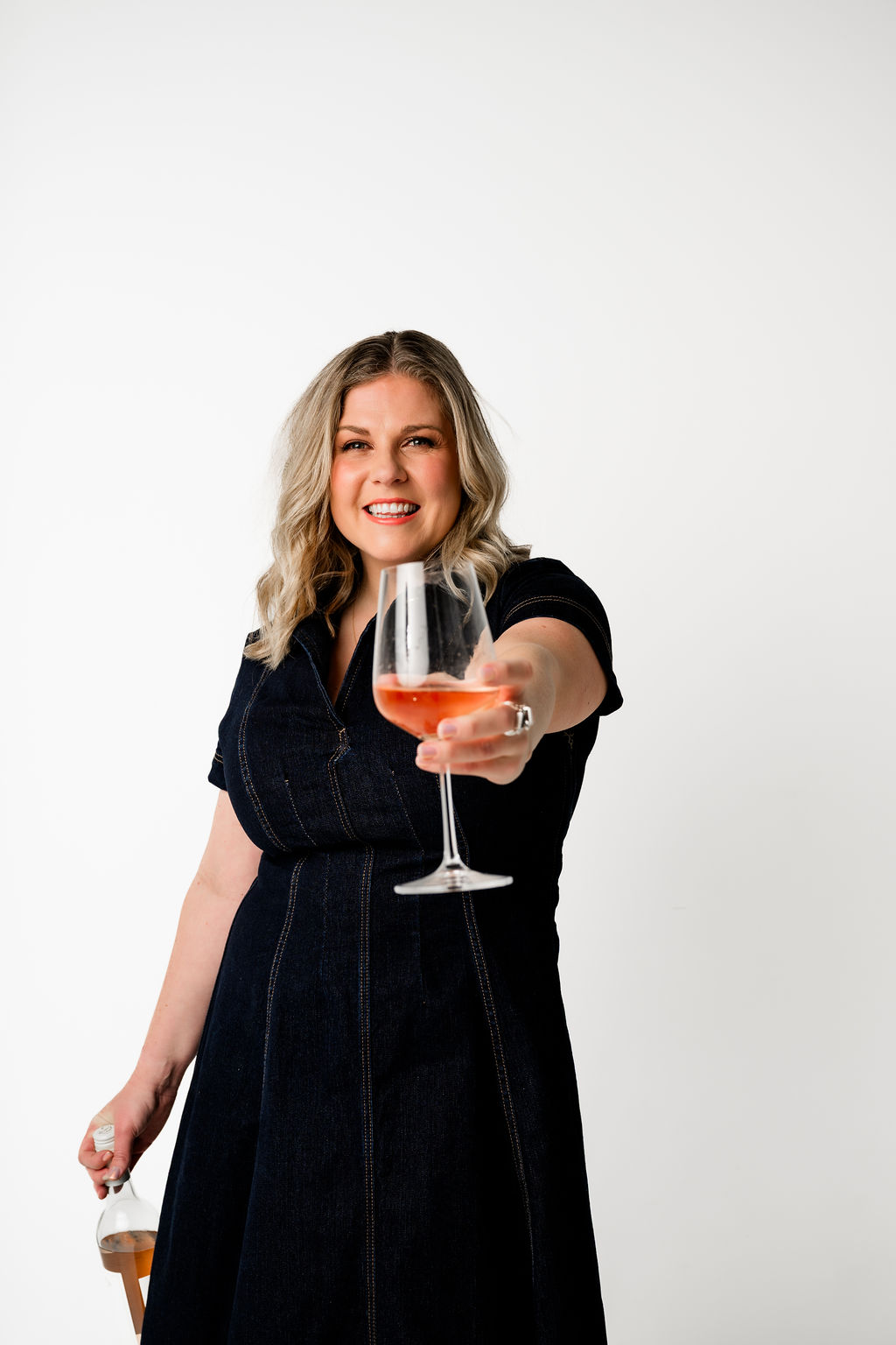 Zoë cheersing the camera