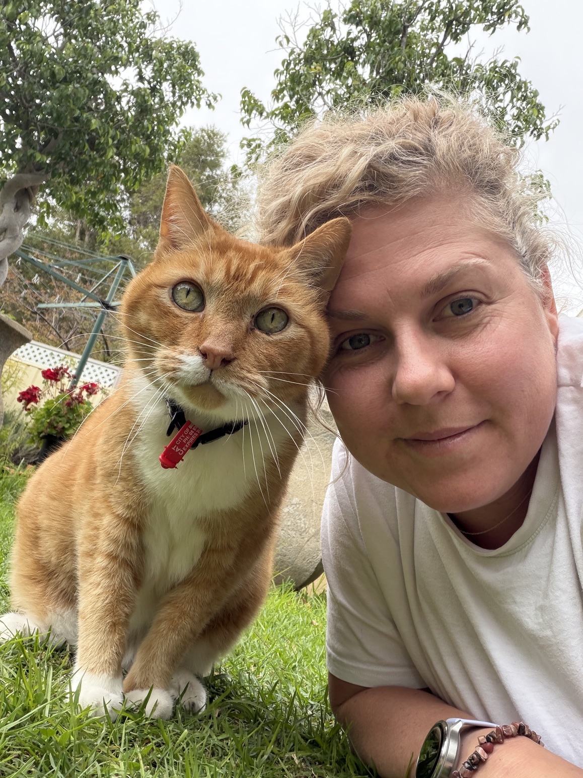 Zoë with cat in garden, Dunsborough