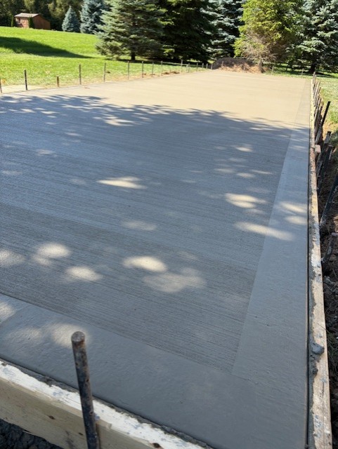 Large concrete pad poured on a rural property in Pickering