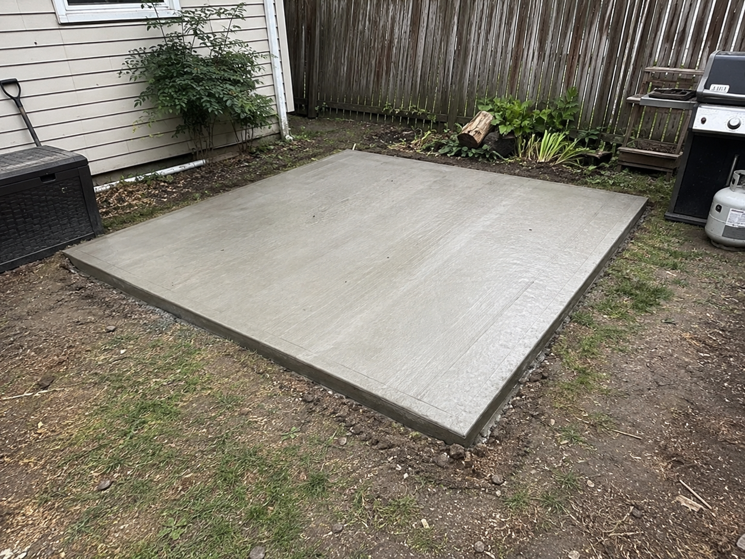 Finished concrete patio slab beside a house in Mississauga