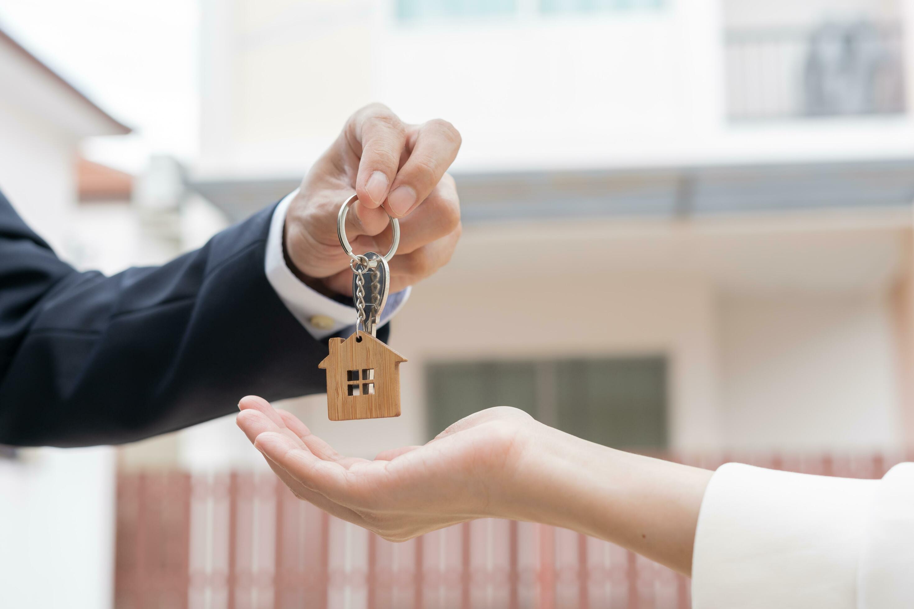 Property exterior, home keys, or a real estate document signing