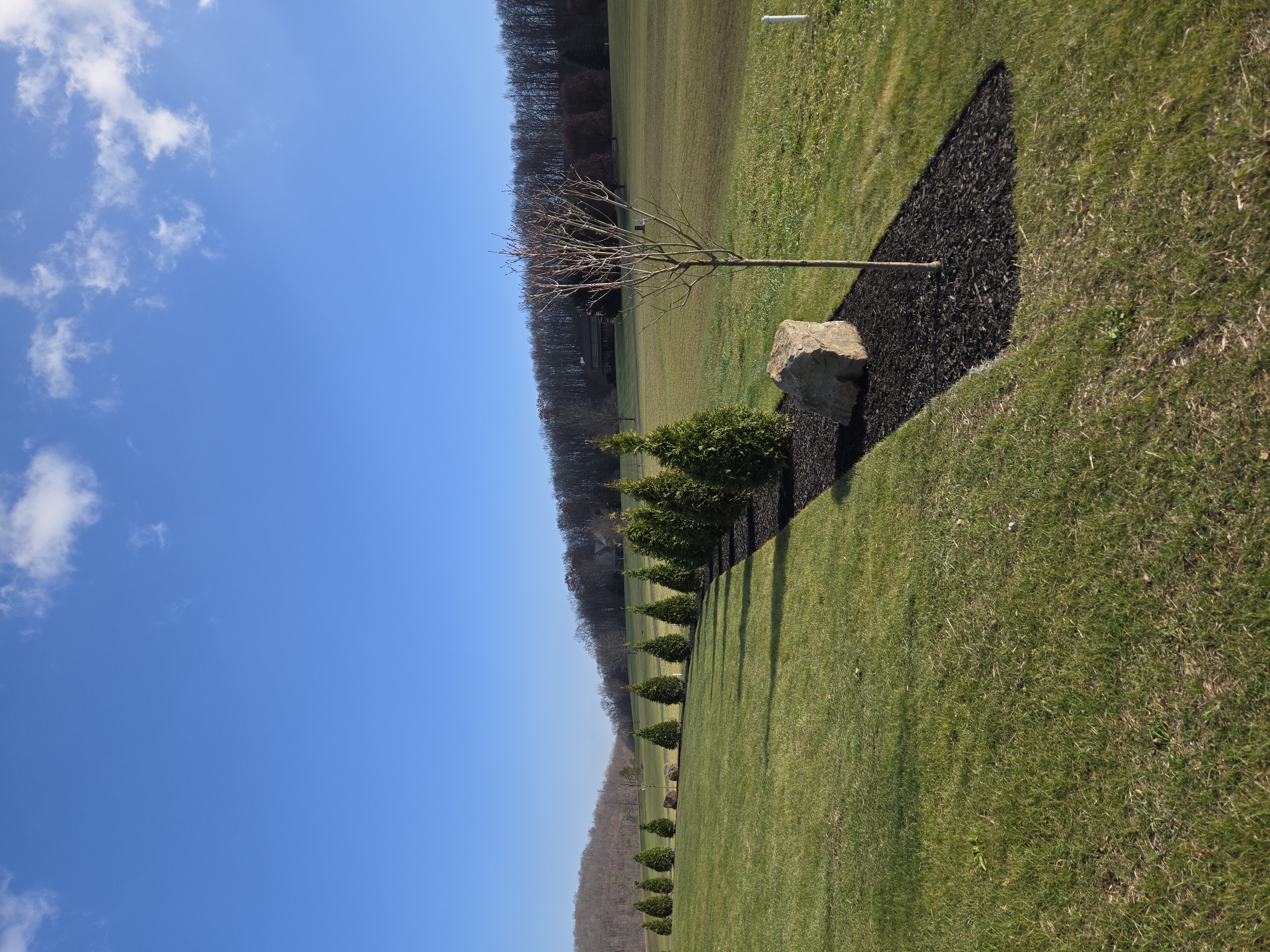 Before and after hardscaping renovation by Central PA landscape professionals