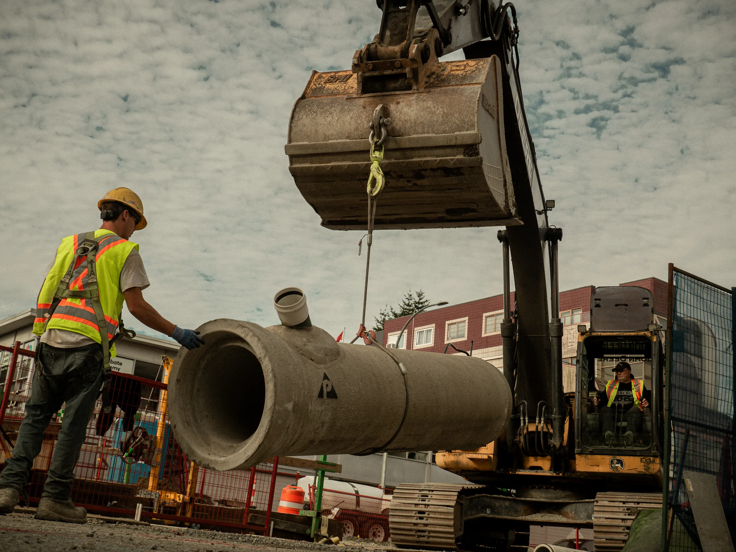 Open trench with pipe installation for utilities in Lower Mainland
