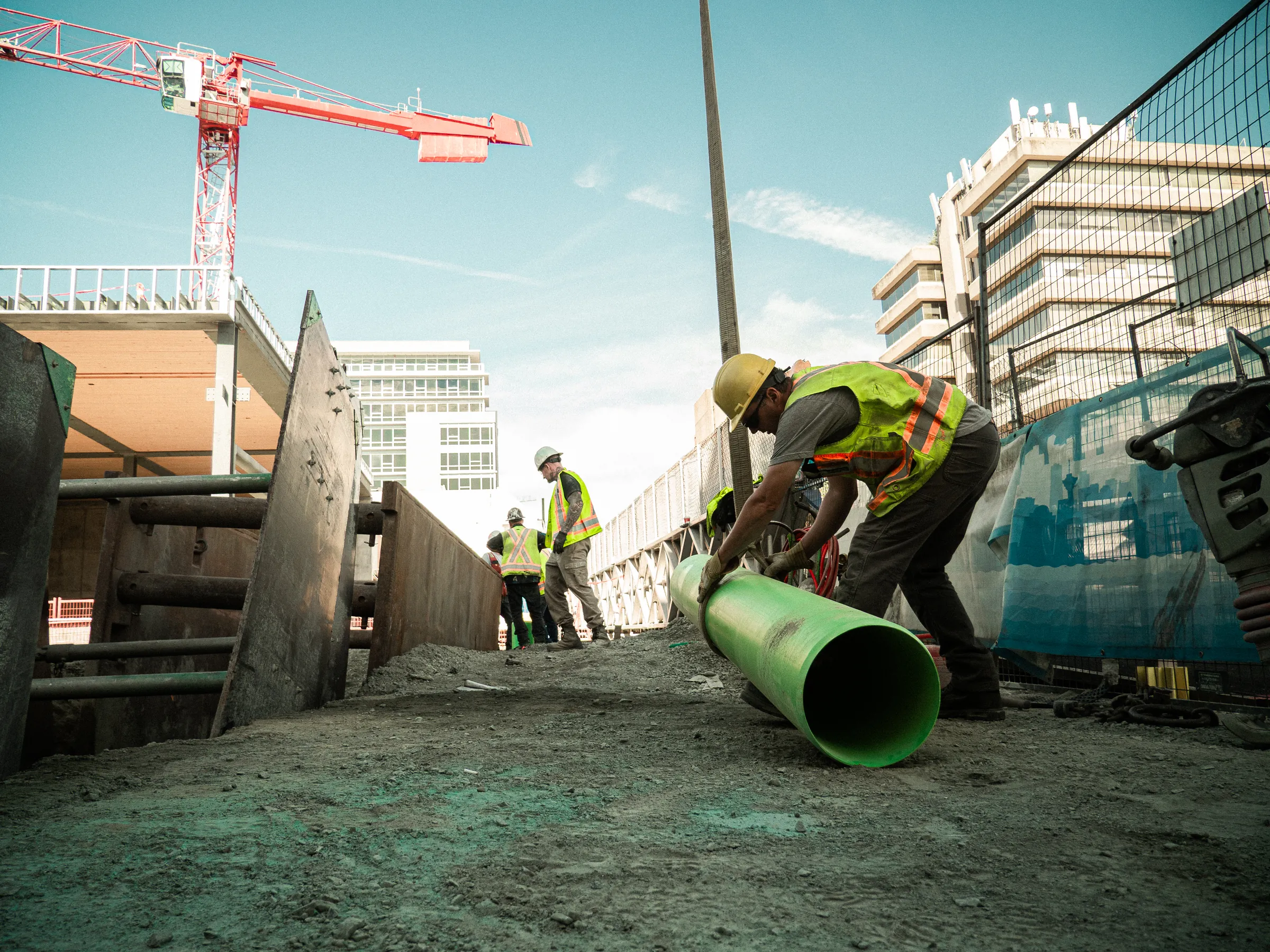 Sewer pipe installation in open trench in Metro Vancouver