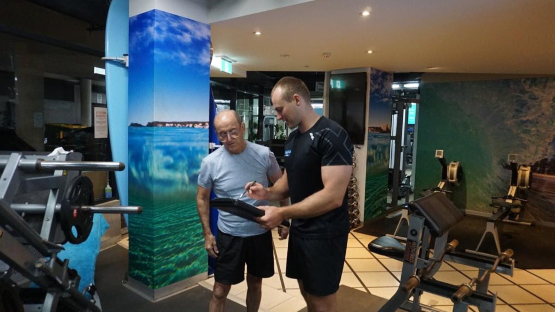 Exercise Physiologist assessing a client at the Health Max studio in Manly