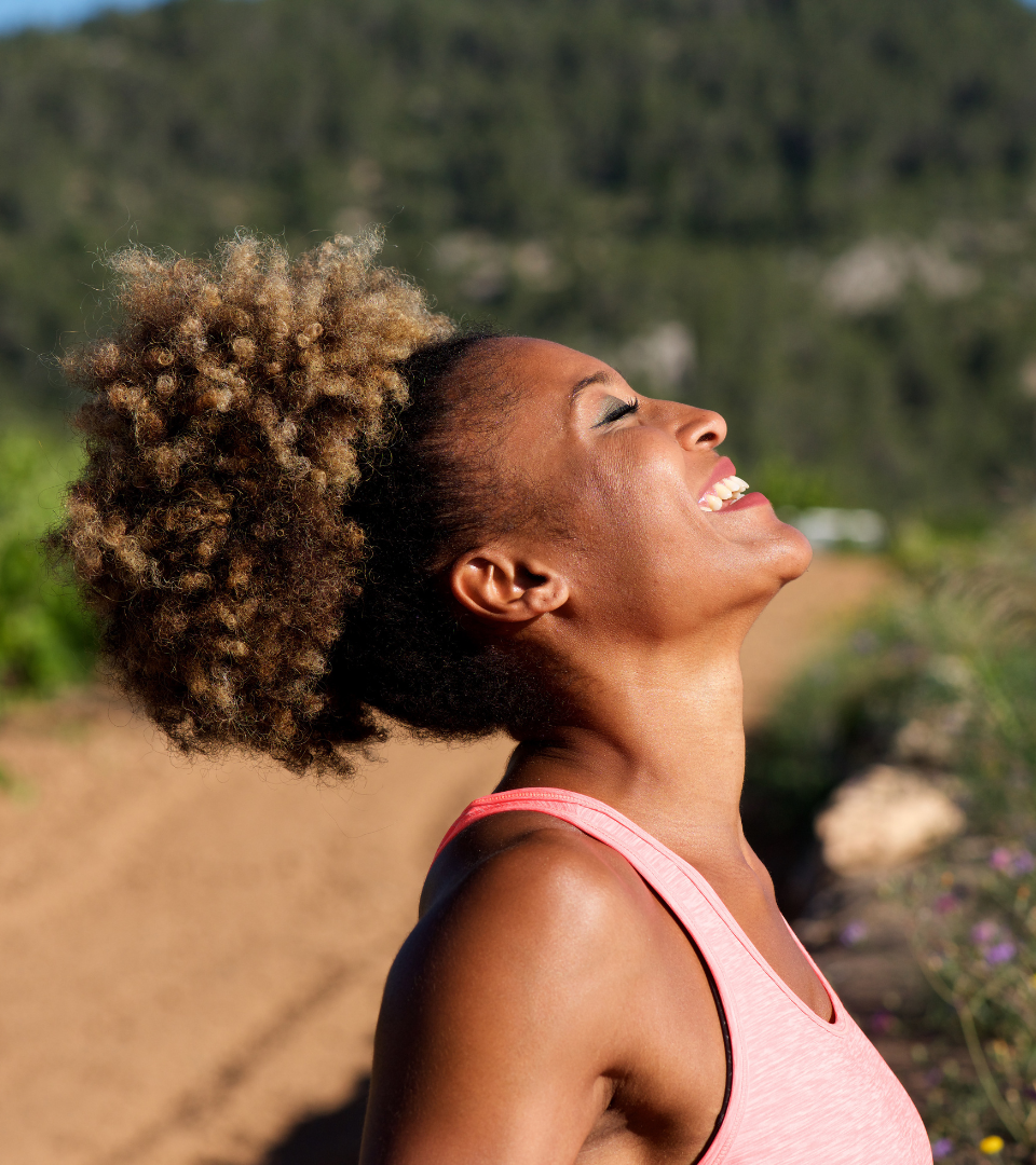 Woman practicing daily wellness rituals